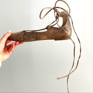 Cross Cross Tie Faux Snakeskin Pointed Toe Flats